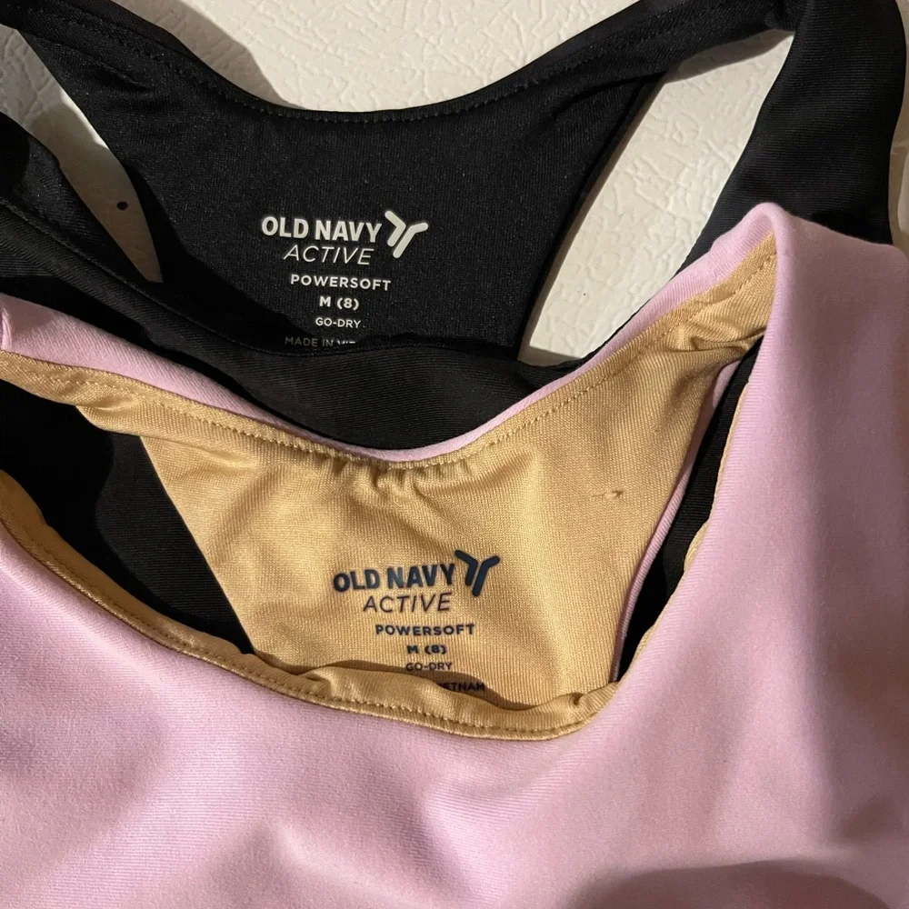 Girls Old Navy Racerback Crop Tanks in Black and light purple